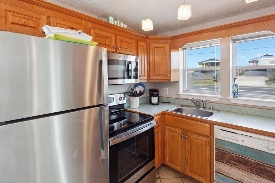 Make something delicious in the nearby open-concept Kitchen with modern appliances.