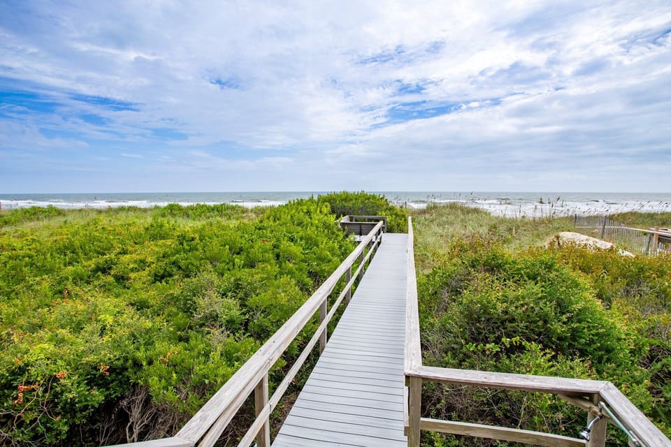Enjoy your own dune top deck and direct access to the beach!