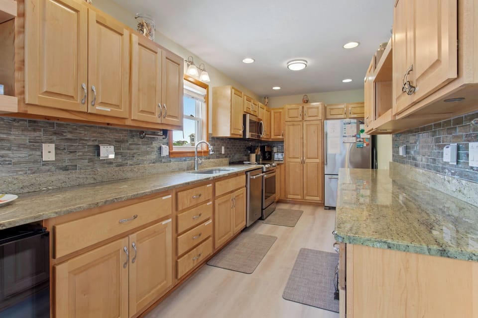 Whip up something delicious in the Kitchen with modern appliances and plenty of prep space.