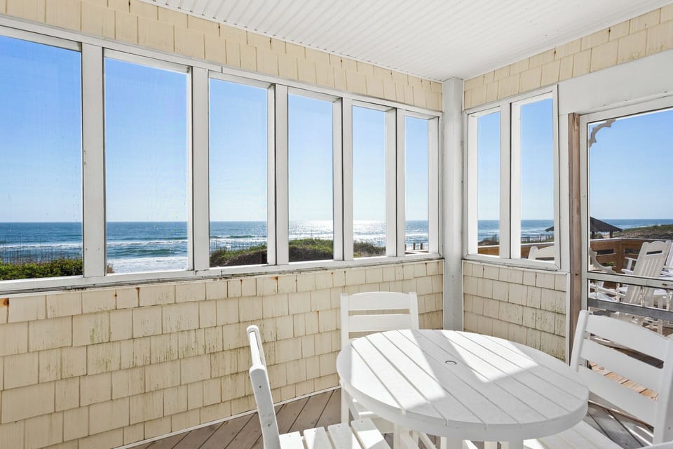 Soak in the fresh ocean breezes in the Screened-In Porch.