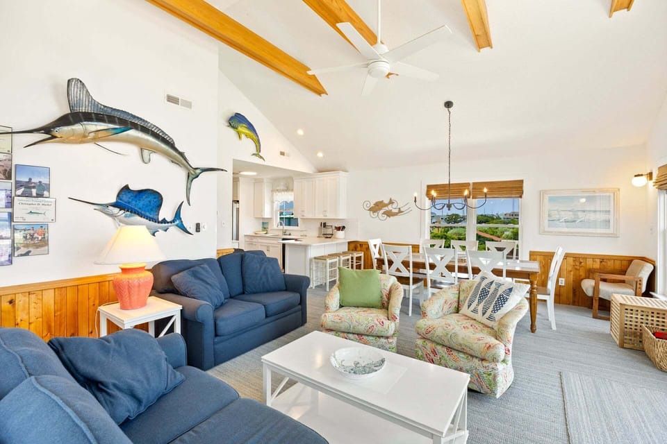 Relax in the spacious Living Area with lots of natural sunlight and plenty of comfortable furniture.