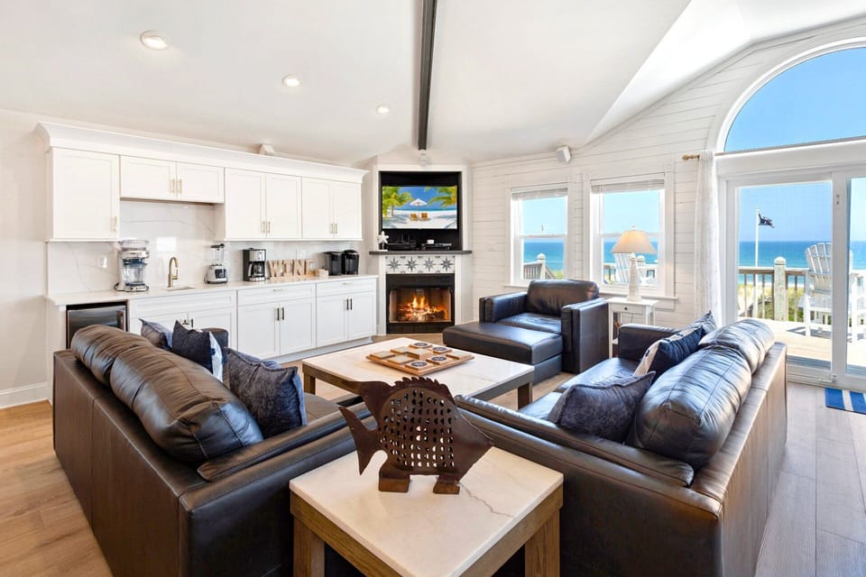Beautifully appointed with an ocean of cozy furnishings, and a flat-screen TV with hook-ups/capabilities for iPod, video game consoles, and Netflix, the central living area is where families can unwind.
