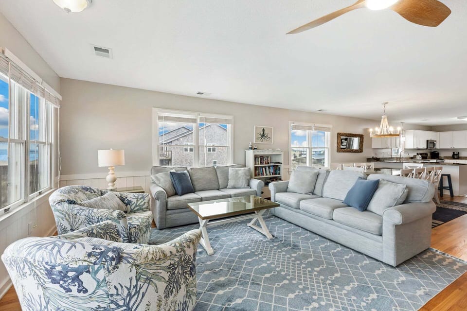 The spacious Living Area with a Flat Screen TV is perfect for relaxing after a day exploring the OBX!