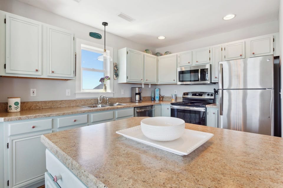 The fully-equipped Kitchen with modern appliances is perfect for whipping up something delicious for the whole family to enjoy.