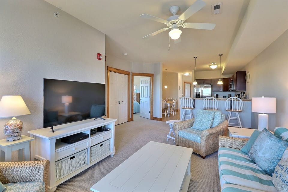 Relax in the spacious Living Area with gorgeous views and a large Flat Screen TV.