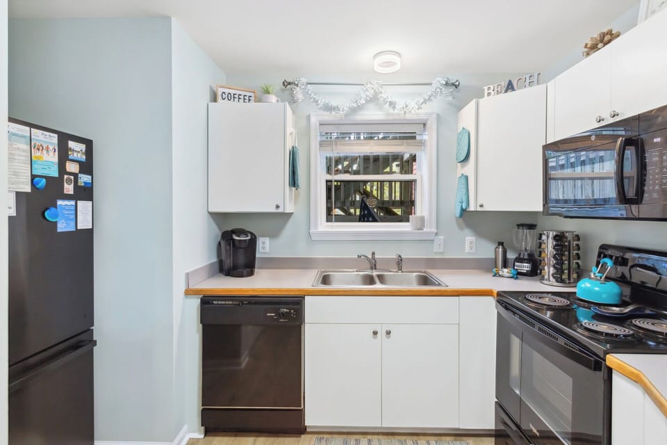 Whip up something delicious in the well-equipped Kitchen with modern appliances!