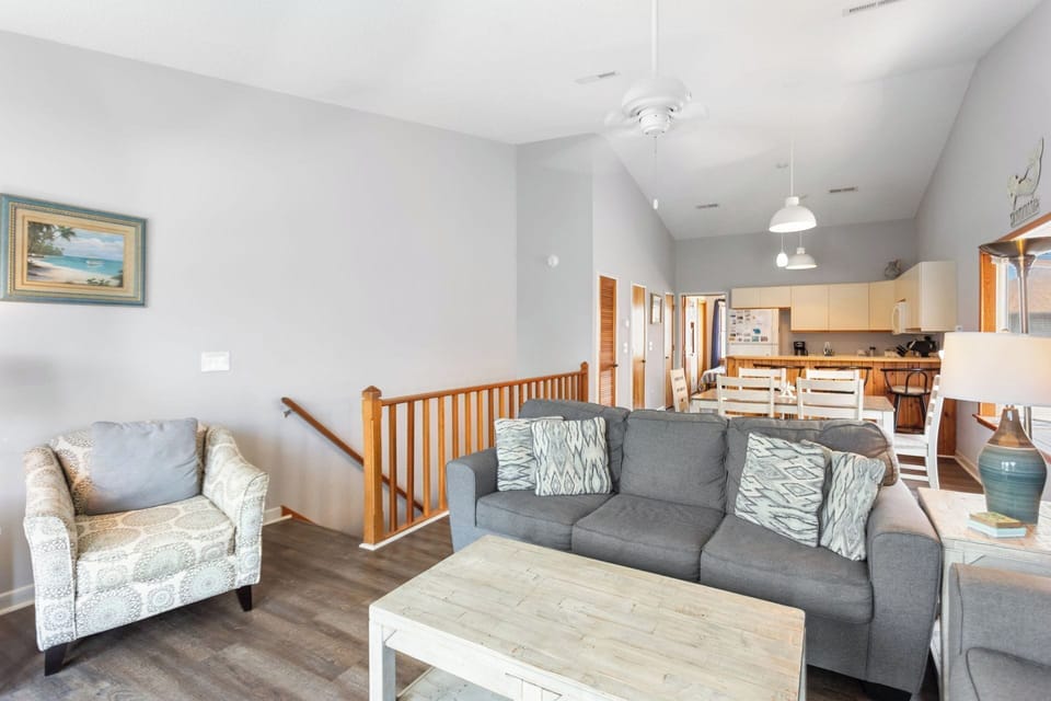 Gather around for a family movie or game night in the open-concept Living Area with Flat Screen TV and comfortable furniture.