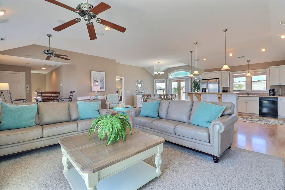 The spacious Living Area has a beautiful as fireplace with a mounted TV, DVD Player, and surround sound!
