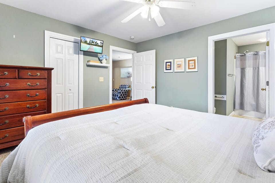 The Mid-Level Queen Master Bedroom has lots of natural light and an attached Full Bathroom.