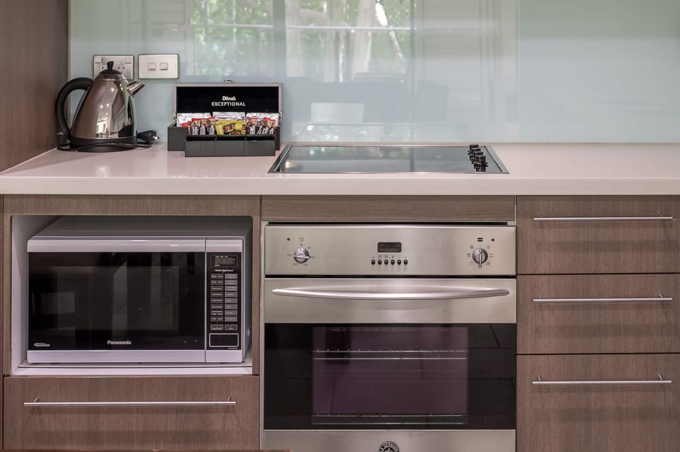 Kitchen with Stone Benchtops and High End Applicances