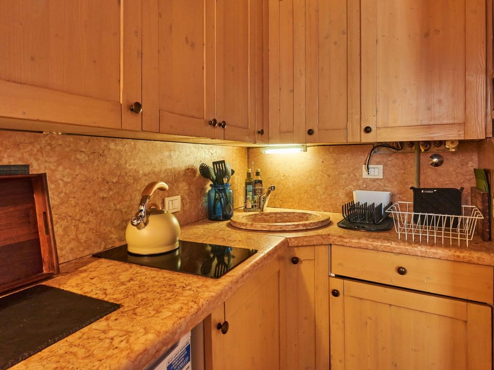 Cabinetry, Countertop, Property, Kitchen Sink, Sink, Tap, Kitchen, Kitchen Stove, Building, Wood