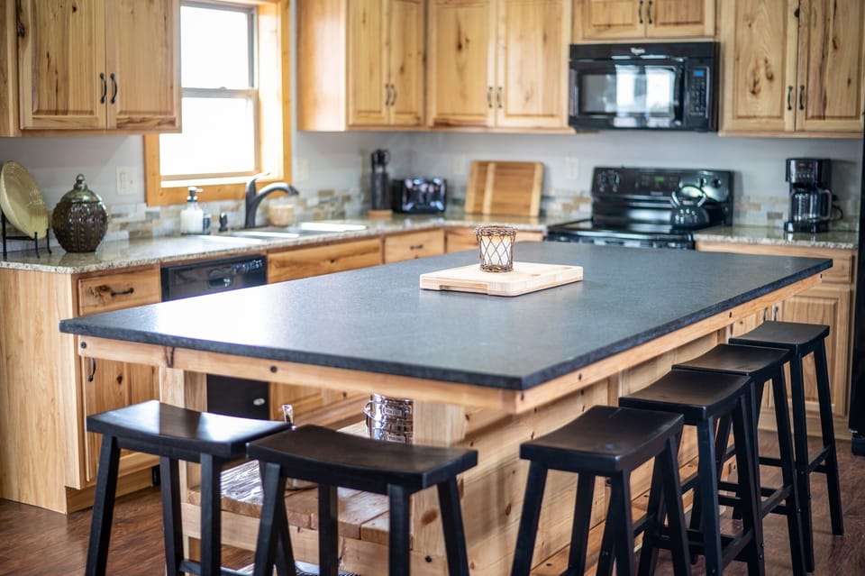 Your friends and family will gather around this  4' x 8' granite bar, the heart and hub of the home. Imagine all the food and fun that will be served at this bar. Come make memories that will last for years to come.  Come and get it!
