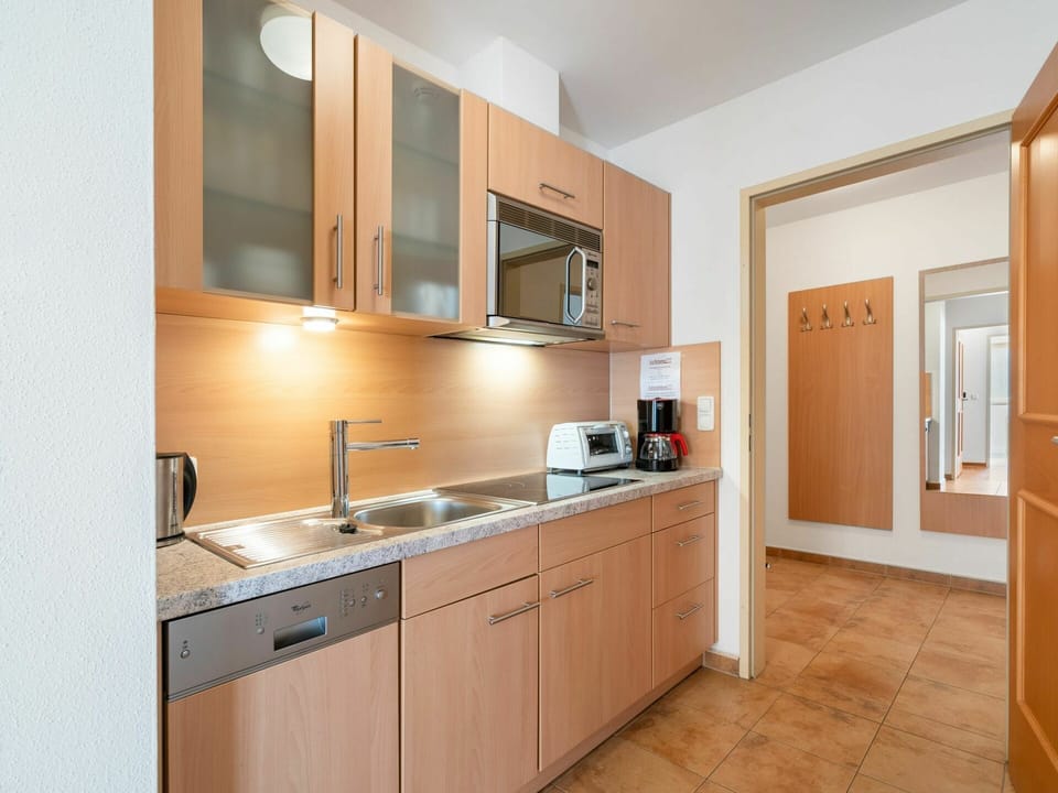 Tap, Cabinetry, Countertop, Building, Kitchen Sink, Sink, Furniture, Plumbing Fixture, Drawer, Kitchen Stove