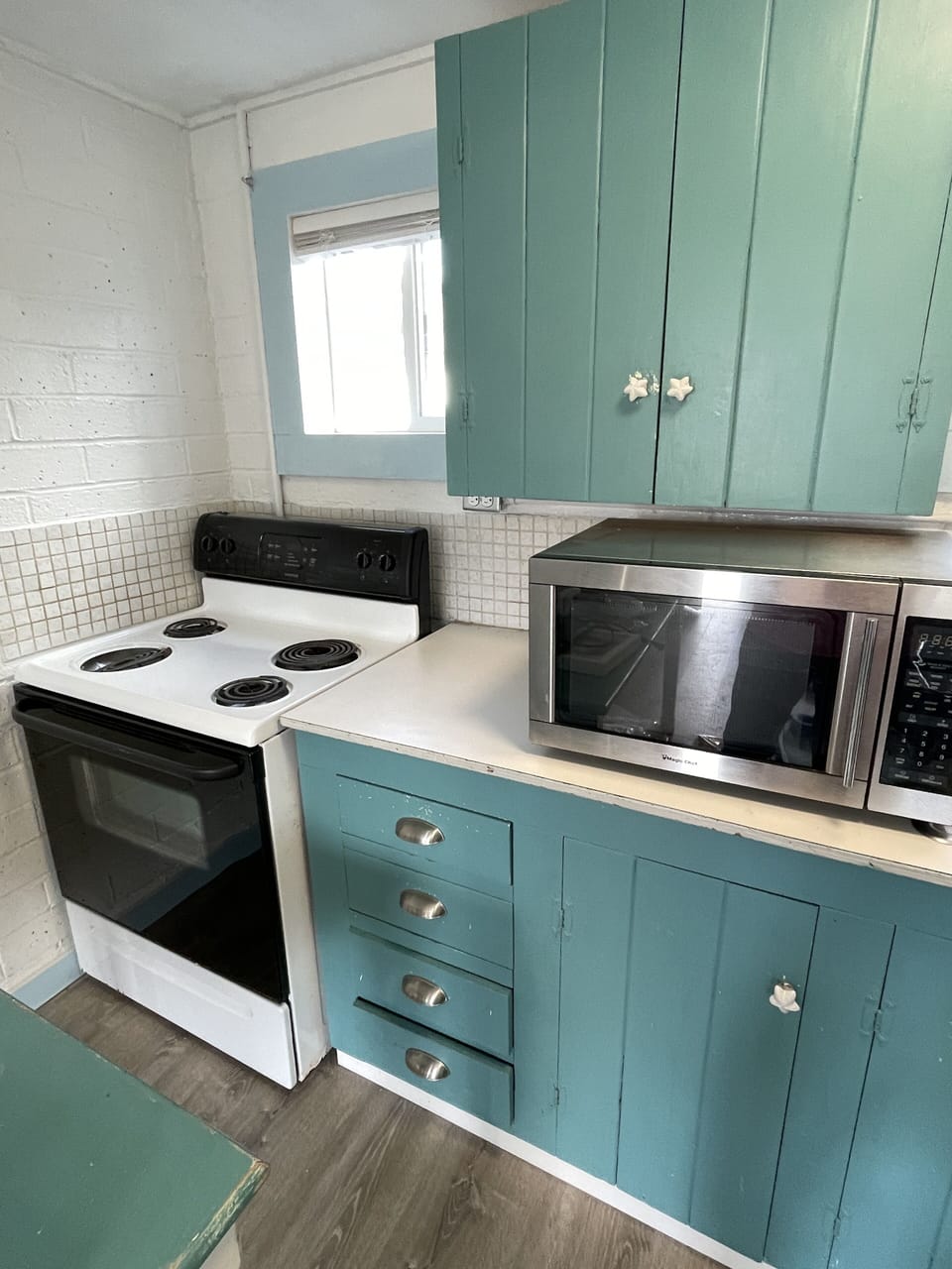 Well stocked kitchen with most anything you need to prepare and serve a meal. 