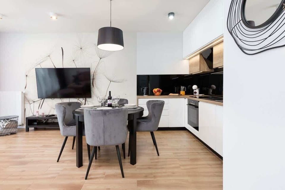 Large table with chairs for eating communal meals. 