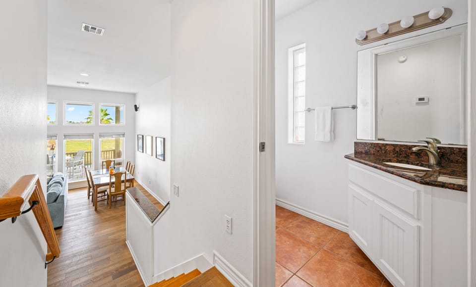 Staircase Landing — Living Area & Bathroom Access