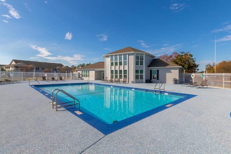Dive into crystal waters perfect for a leisurely swim or refreshing dip, offering a serene escape from the hot Alabama Gulf Coast sun.