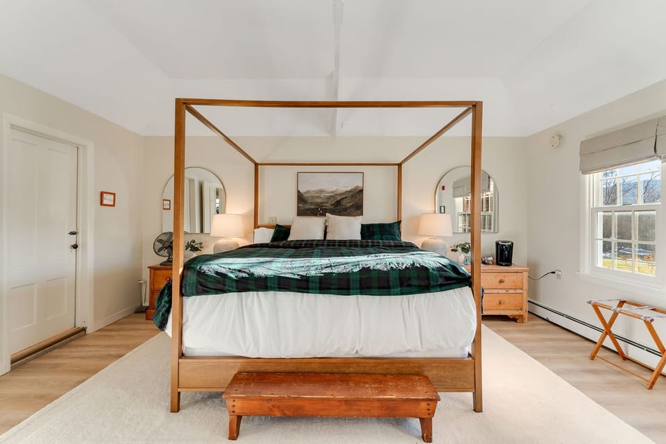 king bedroom suite with sleeper sofa and TV