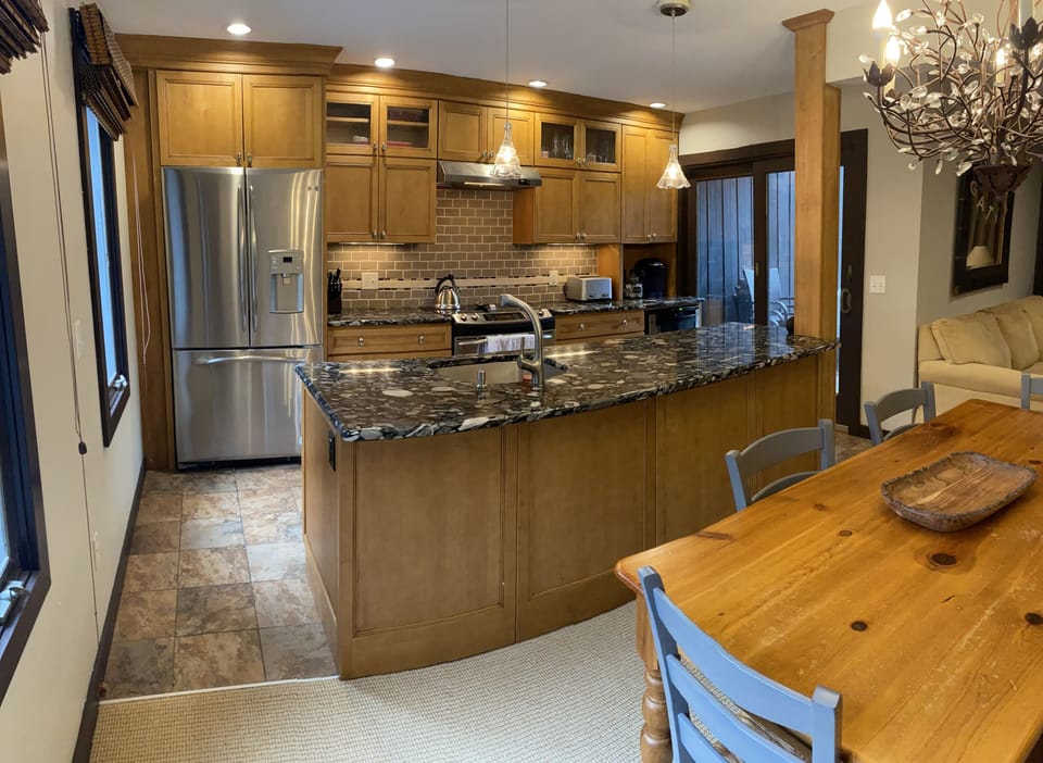 Dream kitchen for any chef! Tons of prep space & well equipped.