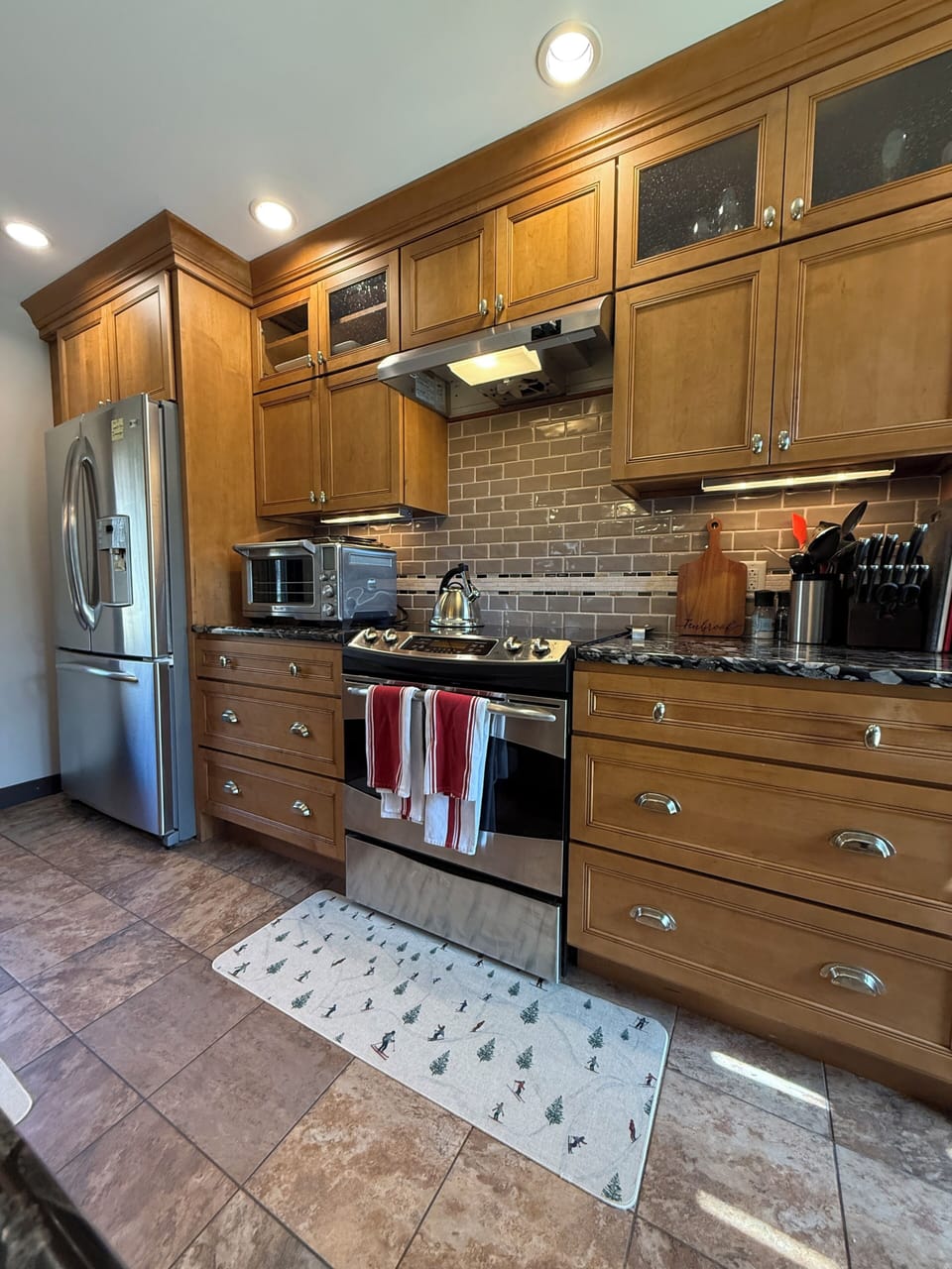 Gorgeous kitchen with all supplies you'll need AND heated floors!