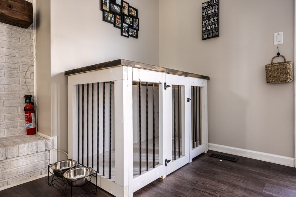 "Sparky" will be comfortable in the custom built cage while you are out .