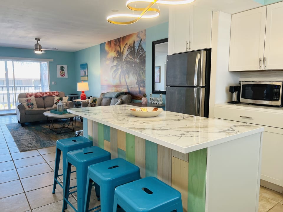 Plenty of seating at the island + 4 at the dining table.