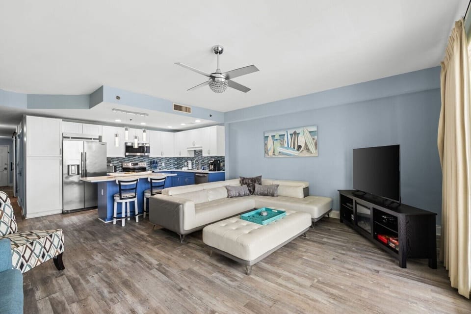 Open Concept Living Room with Ocean Views, Balcony Access, Flat Screen TV and Sleeper Sofa