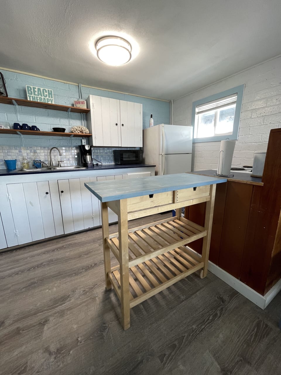 Well stocked kitchen with most anything you need to prepare and serve a meal. 