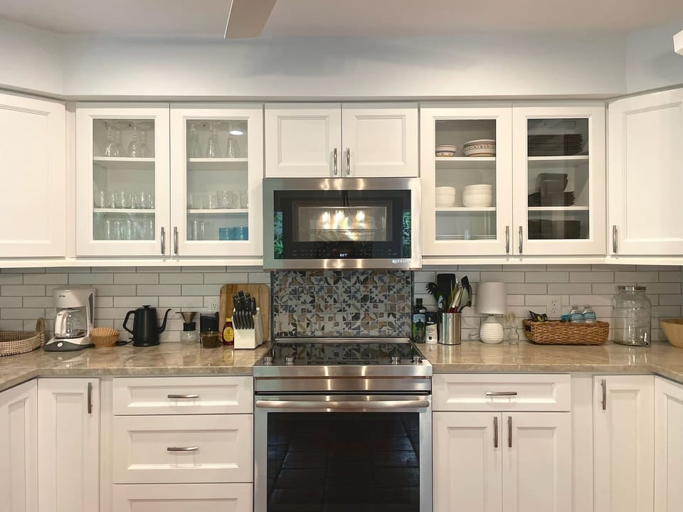 Renovated kitchen stocked with adult and kids dinnerware, pots, pans & staples!