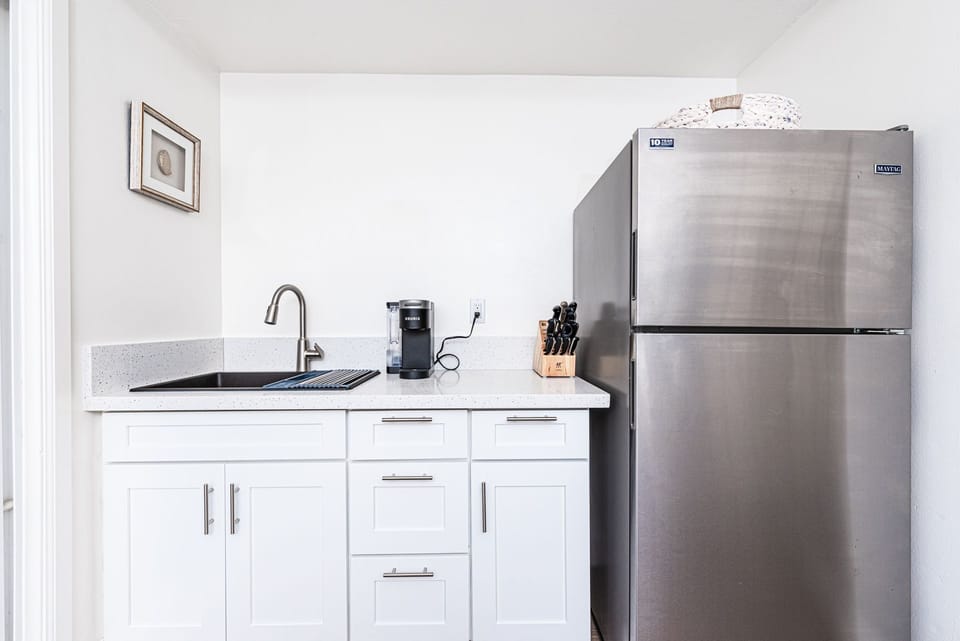 Located off of the lower level's living area is a small kitchenette.
                