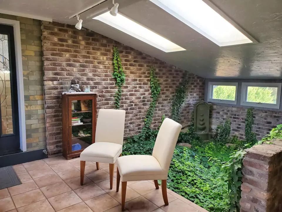 Spacious Indoor Ivy Atrium Entrance