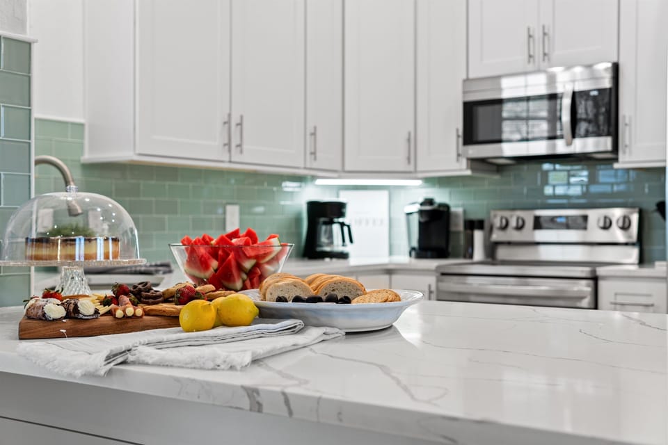 Ample kitchen counter top space and amenities