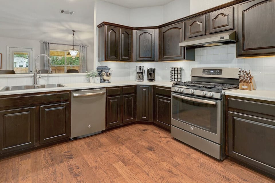 Fully equipped kitchen for home-cooked meals in your Austin vacation rental.