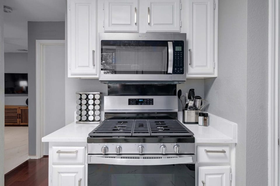 Fully equipped kitchen designed for longer stays, featuring modern finishes, ample storage, and natural light.