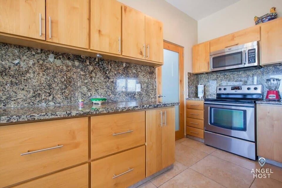 A fully-equipped kitchen for preparing meals at home