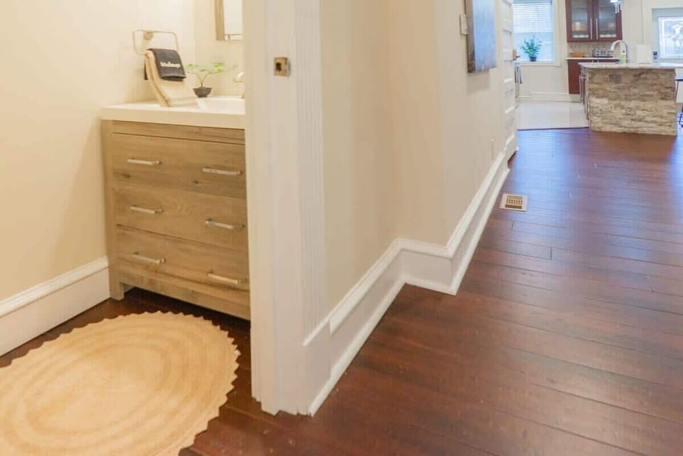 A conveniently located half bathroom on the first floor of the home.