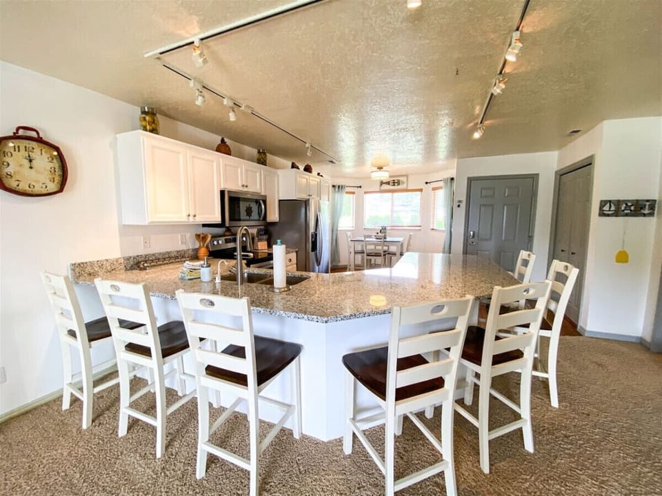 Open kitchen layout ideal for group dining and socializing
