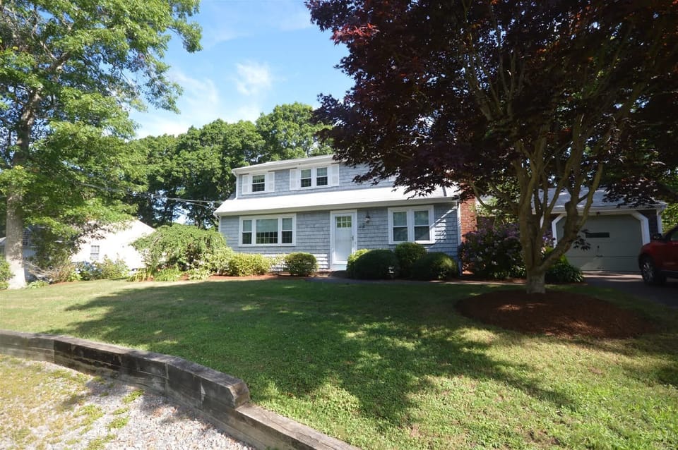 Front of the house in full summer bloom