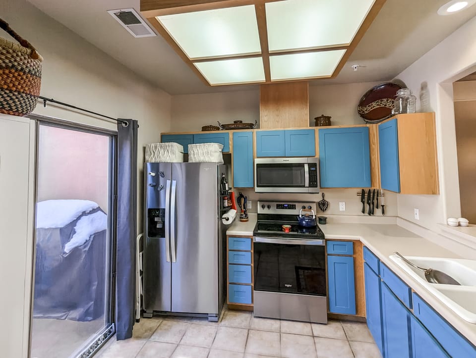 Fully equipped kitchen with natural light and ease of cooking post hike
