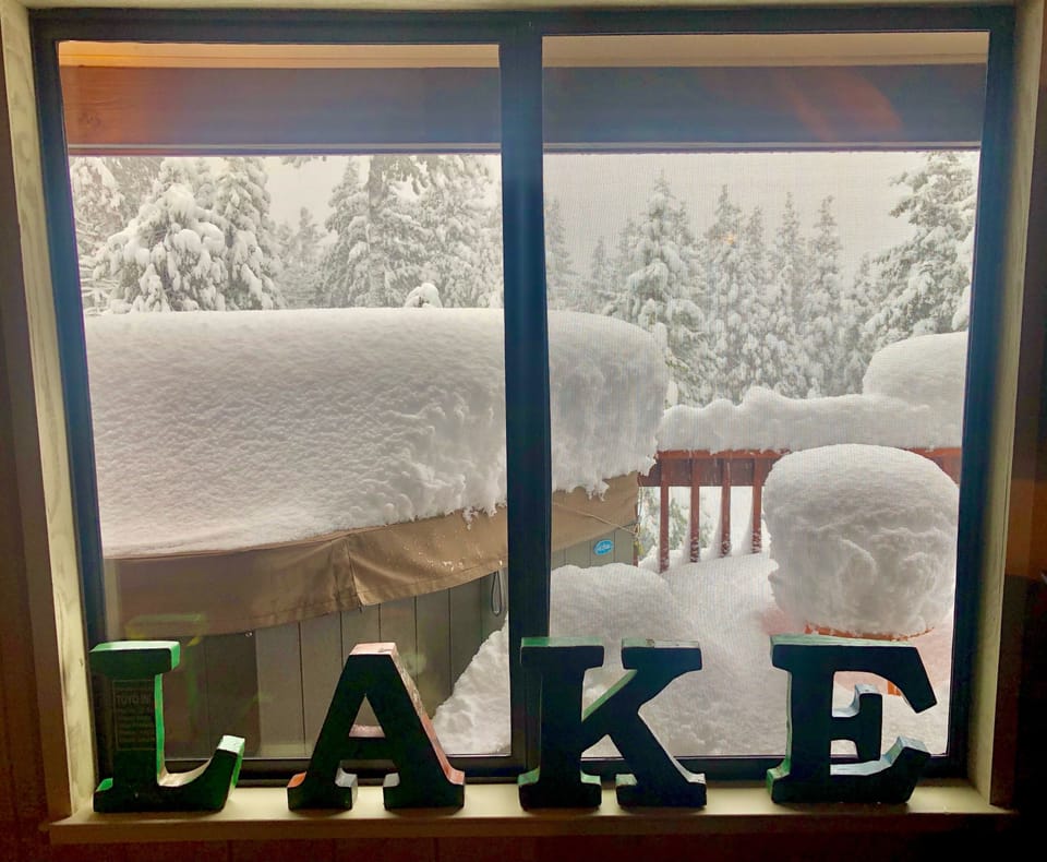 Enjoy big snow from the Living Room, complete with ironic décor!