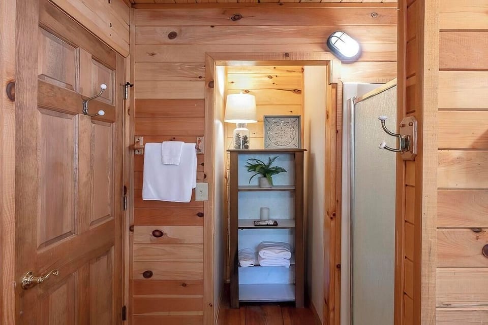 Main level bathroom with garden/soaking tub and separate shower
