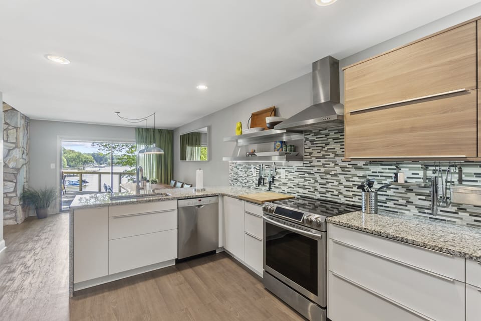 Updated kitchen with new appliances, counters and cabinets, island seating for 4.