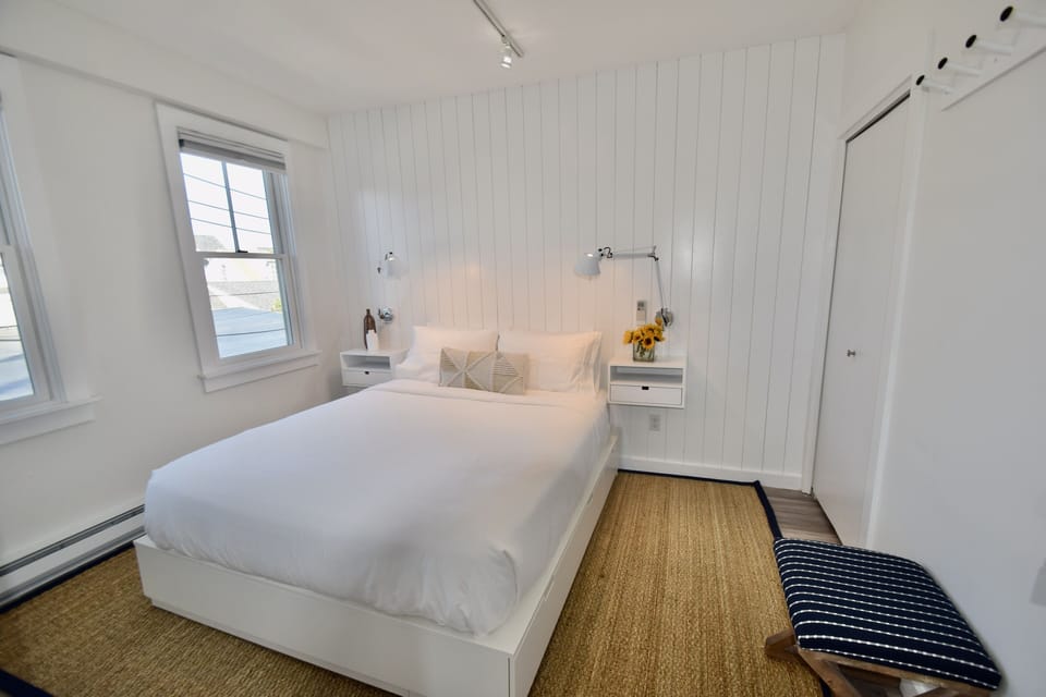 - Queen size platform bed with storage
- Blackout shades throughout