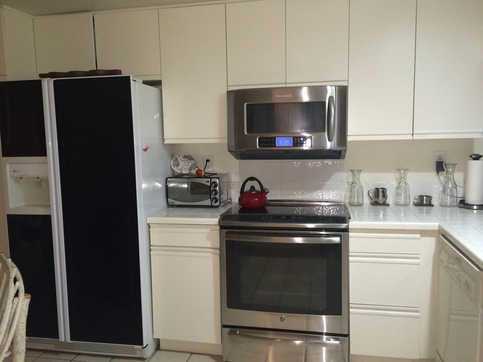 Modern cooking appliances and spacious countertops, the kitchen has it all!