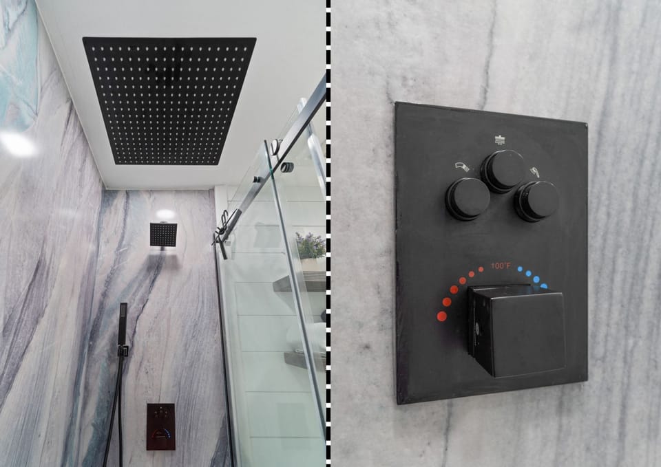Walk-in shower with 16" rain shower, wall shower & hand held.
