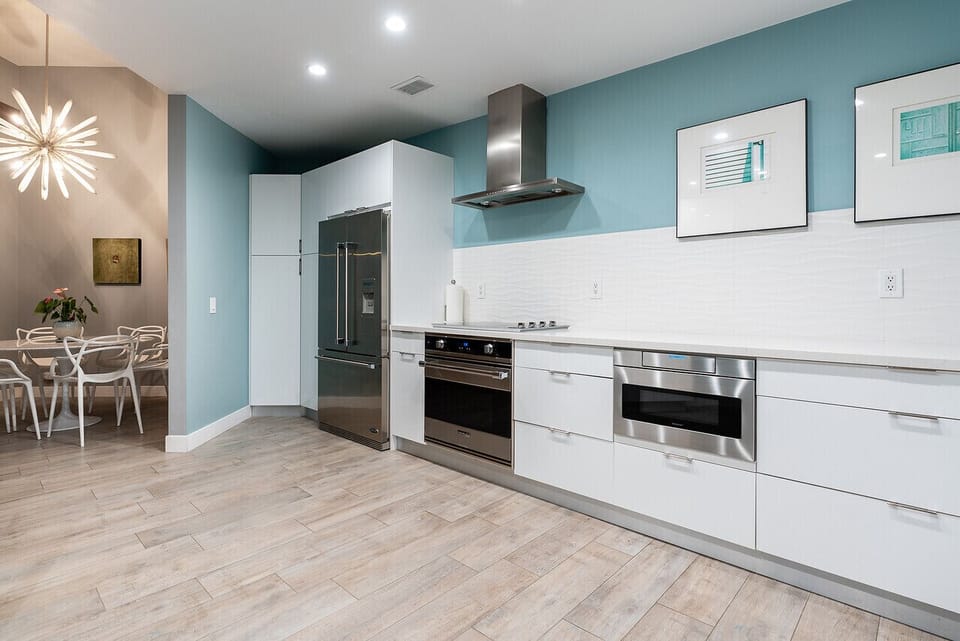 Bright kitchen with high-end Stainless steel appliances 