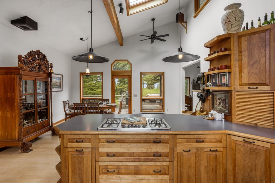 Full kitchen with an open dining area.