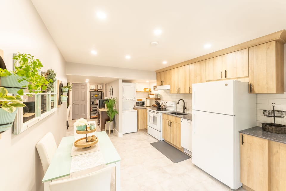 Kitchen: dishwasher, stove, fridge, washer dryer