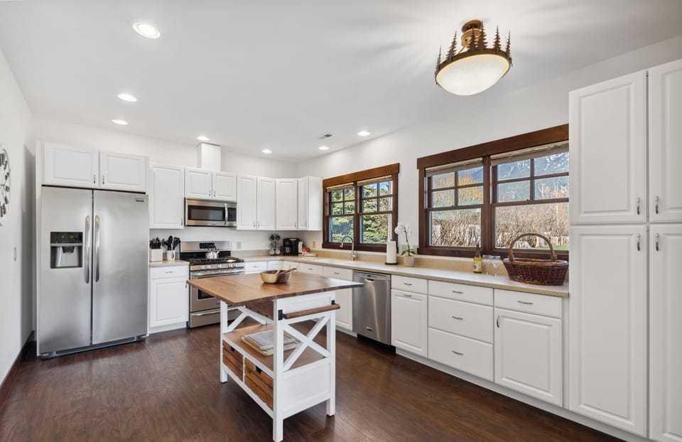 Whip up meals on a stylish island while enjoying mountain views and ample space!
