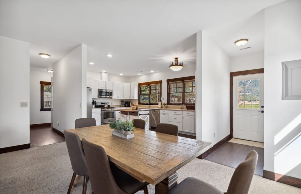 Dining room table with space for six-additional seating in the bonus room.